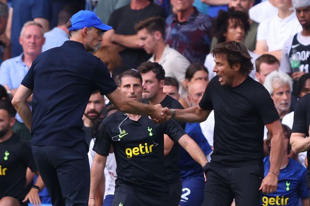 Tuchel refused to let go of Conte's hand